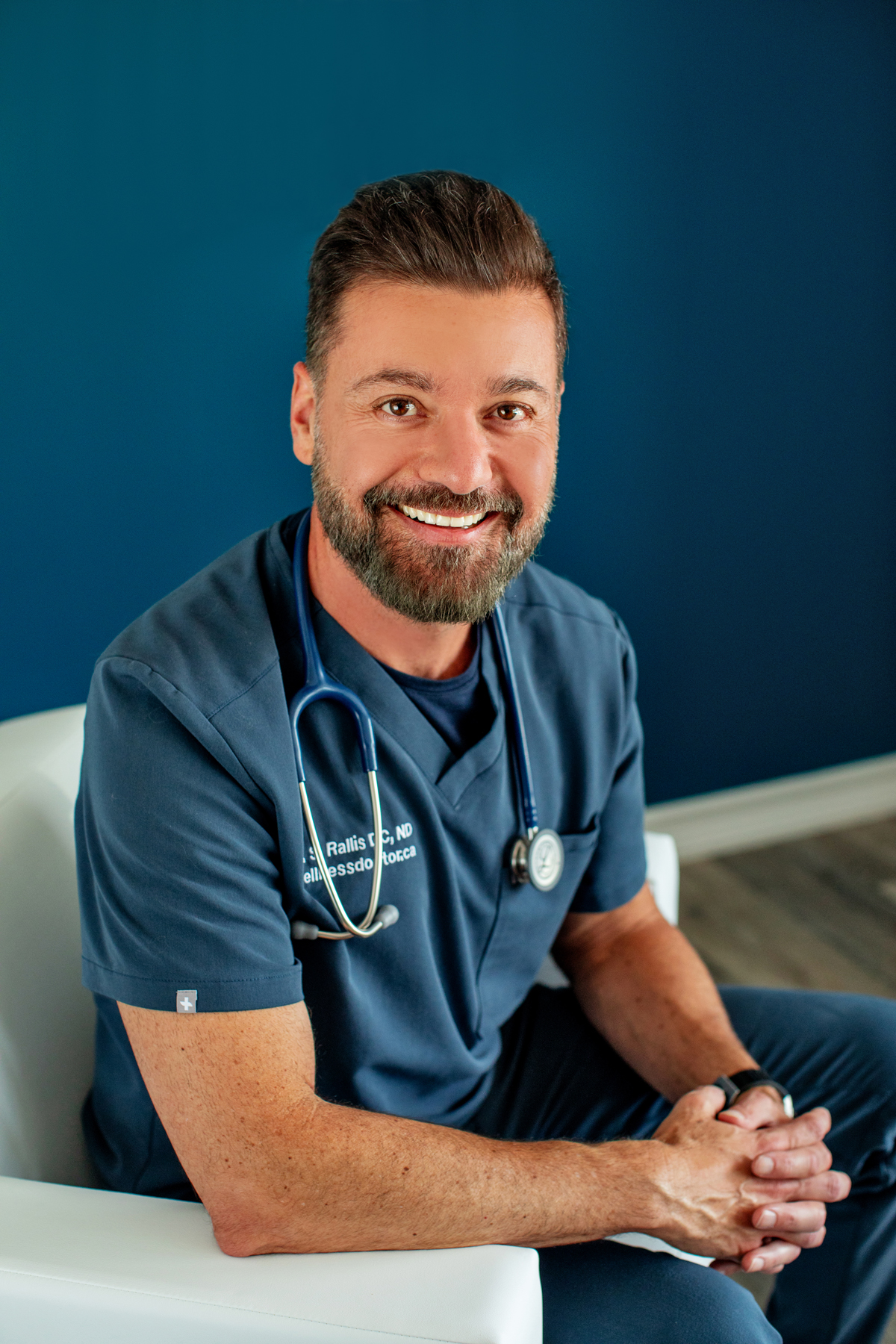 Dr. Steve Rallis seated portrait